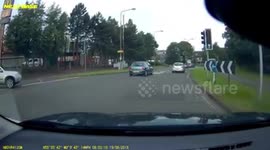 Where did that come from?! Lawnmower jumps a red light
