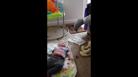 Super cute baby thinks feet are absolutely hilarious