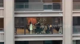 Quarantined Chinese citizens take part in dance battle on their balconies during COVID-19 outbreak