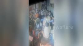 Indian train station escalator suddenly reverses during rush hour, injuring one