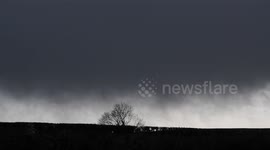 Mean Bacl Skies & Blowing Snow