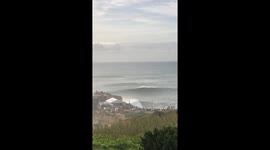 Surfer makes Air during World Surf League Tow Surf Challenge at Nazaré, Portugal