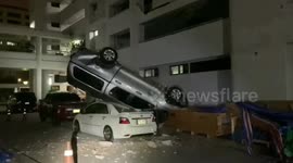 Thai driver shunts pickup truck off multi-storey car park before fleeing scene