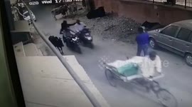 Bike-borne robbers intercept jeweller on moped in broad daylight to snatch his belongings