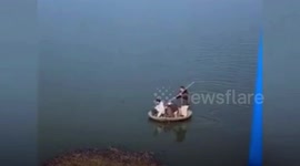 Police catch fisherman who was paid to transport three people across Chinese river during coronavirus lockdown
