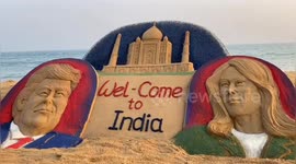Sand artist makes welcome sculpture of the Trumps for their visit to India
