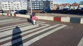 the storm blows the children over and backwards, especially the end of the video is very funny