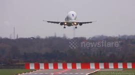 Giant Airbus Beluga lands and departs in crosswinds at Hawarden Airport