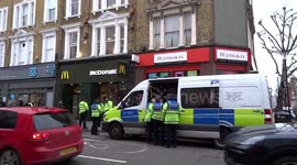 Police vehicles spotted outside Earls Court tube station in London