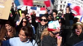 Dominicans take to the streets of the Spanish capital in protest after election suspension