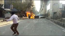 Reports of one police officer dead as violence breaks out on streets of New Delhi during President Trump's first visit