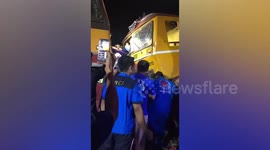 Emergency workers seen rescuing man after train crash in Thailand