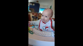 Baby dancing on video of party