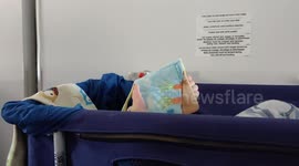 Footage of baby crib for airplane travel.
