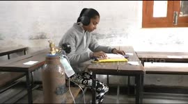 Student with lung condition takes oxygen cylinder with her into exam in north India