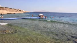 Italian Tourists Sitting Party Under Sea Umbrella In Sharm El Sheikh