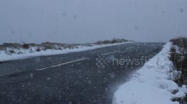 Snowing Heavy Over Mountain Road