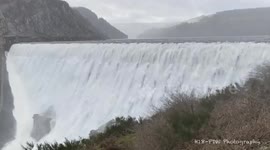Gallons of water pours from overflowing Welsh dam after weeks of rain