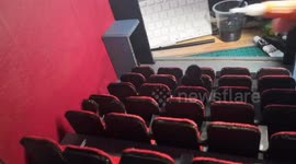 Innovative man in China handcrafts mini cinema out of cardboard and old clothes