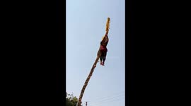 Woman tied to 60-foot-pole and hoisted like a flag in dangerous banned ritual in India
