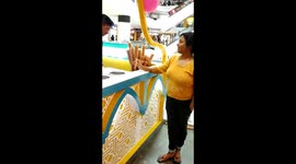 Ice cream vendor plays funny serving trick on lady customer