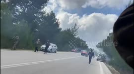 Protesters in Greece flee as authorities fire rounds of tear gas