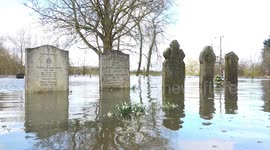 Graveyard under water as River Severn bursts banks in rural Worcestershire