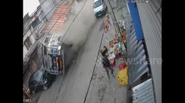 CCTV footage captures truck lose control and narrowly miss pedestrians in India