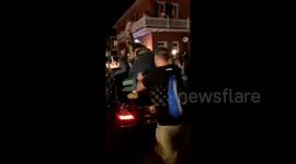 'Mardi Gras is wild!' Men dancing on moving car fall off during insane New Orleans party