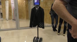 A human is represented by a robot in a remote meetup 12,000 Km away