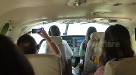 Cessna 208 landing at small airstrip in Selous Game Reserve in Tanzania next to Mtemere gate