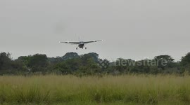 Cessna 208 landing at airstrip in Selous Game Reserve Tanzania