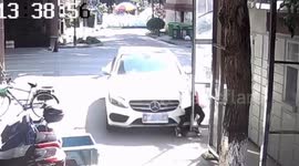 Chinese mother knocks her daughter over after accidentally pressing car accelerator