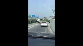 Truck Crashes Into Low Motorway Bridge