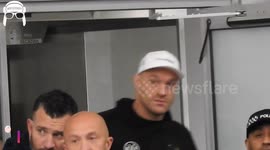 Discoboy gives Tyson fury a welcome home at Manchester airport