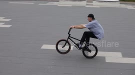 Extreme Wheelie Grind on BMX Bike