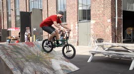Cool BMX Bike Rider does extreme difficult trick