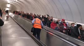 Greek soccer fans sing on London Underground ahead of Arsenal clash