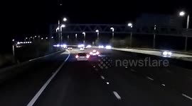 Moment UK driver smashes into back of another vehicle almost causing high-speed pile-up on highway