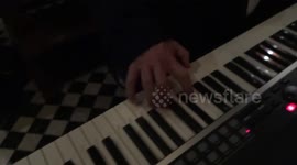Pianist entertains visitors at The Milestone Hotel foyer - London