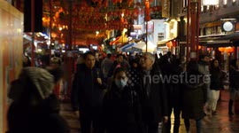 Anti-coronavirus face masks becoming common in London's Chinatown