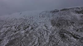 Snow Melt On Mountain - Drone View