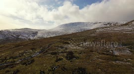 Thawing Snow On Mountain