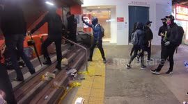 Hong Kong Protesters set fire to an exit of the Mongkok MTR