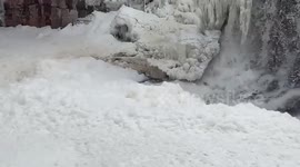 Huge build up of foam on the Big Sioux river in South Dakota