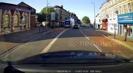 Idiot in an Audi forces bus to slam on brakes