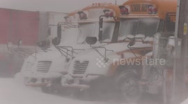 Snow and blizzard shuts down school buses in southern Ontario as lake effect snow and high winds made travel dangerous