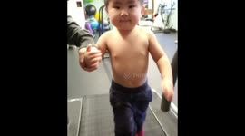 2 year old working out on a treadmill