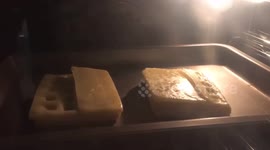 Time lapse of cheese melting on potato waffles