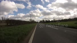 Close pass on cyclists risks head-on collision